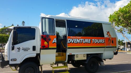 A close up of a tour vehicle with an open door